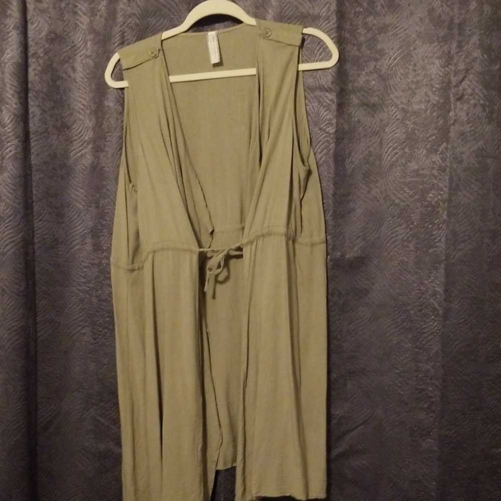 Olive green vest.